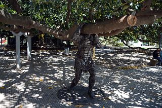 15 Sculpture Of Man Holding Up Large Tree Plaza Ramon J Carcano In Recoleta Buenos Aires.jpg